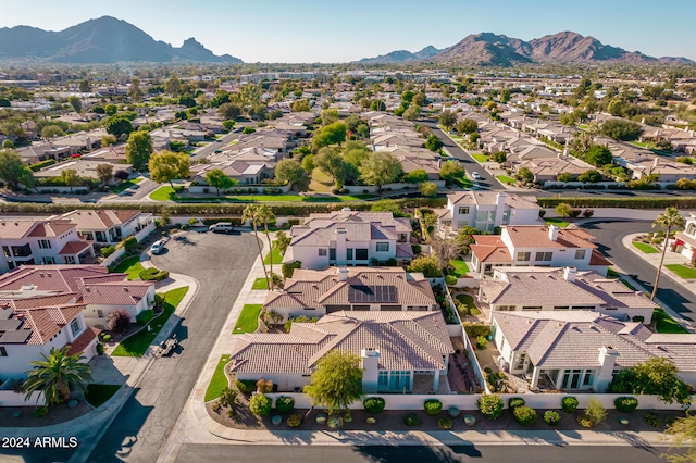 birds eye view of property featuring a mountain view