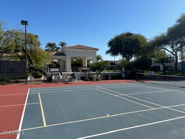 view of sport court featuring a gazebo and basketball court