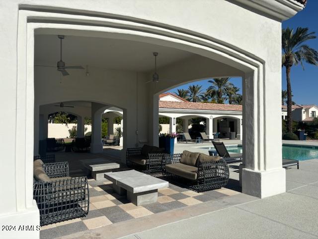 view of patio / terrace featuring an outdoor living space and ceiling fan