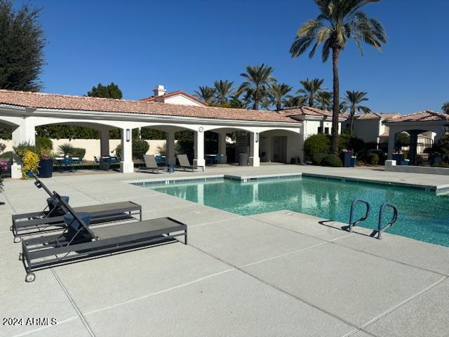 view of pool with a patio