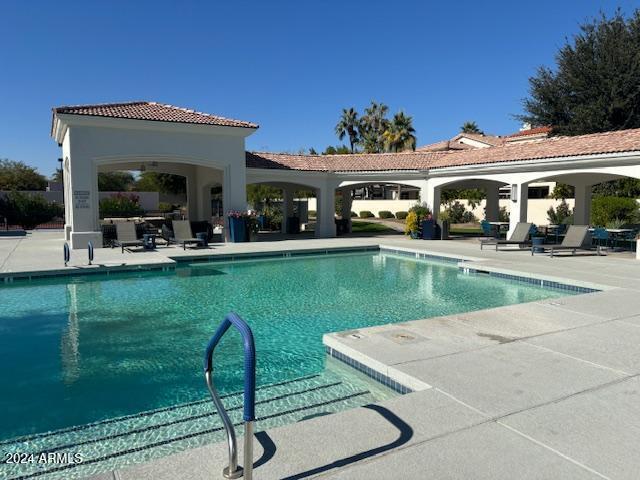 view of pool featuring a patio area