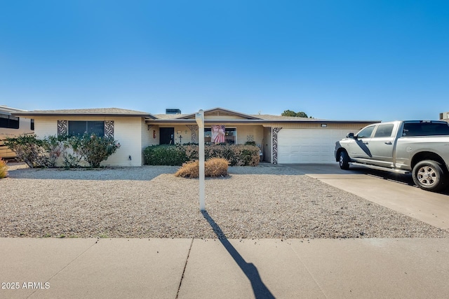 single story home with a garage