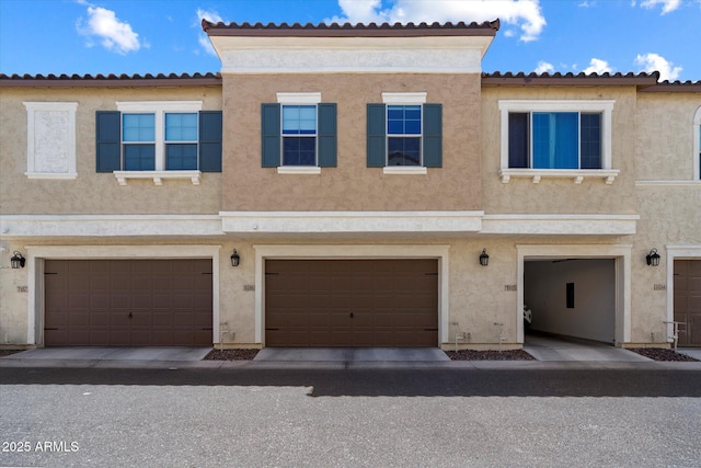 1823 E Chelsea Ln Unit 106, Gilbert, AZ 85295 - multi unit property with stucco siding, an attached garage, and a tile roof