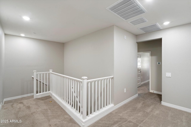 1823 E Chelsea Ln Unit 106, Gilbert, AZ 85295 - corridor featuring an upstairs landing, carpet flooring, baseboards, and recessed lighting