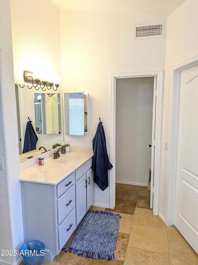 11424 S Obispo Dr, Goodyear, AZ 85338 - bathroom featuring vanity and baseboards