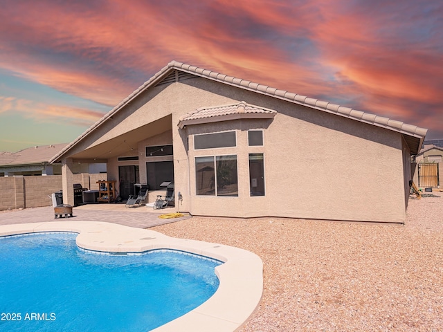 11424 S Obispo Dr, Goodyear, AZ 85338 - view of pool featuring a patio area and fence