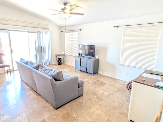 11424 S Obispo Dr, Goodyear, AZ 85338 - living area with ceiling fan, lofted ceiling, and baseboards