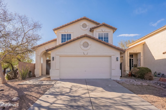 view of front of property with a garage