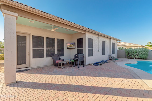 view of patio / terrace featuring fence and a fenced in pool