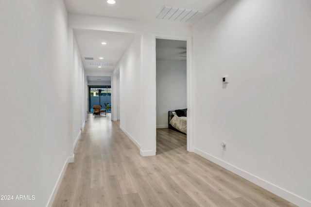 hall featuring light hardwood / wood-style flooring