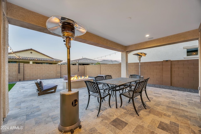 view of patio featuring a fire pit