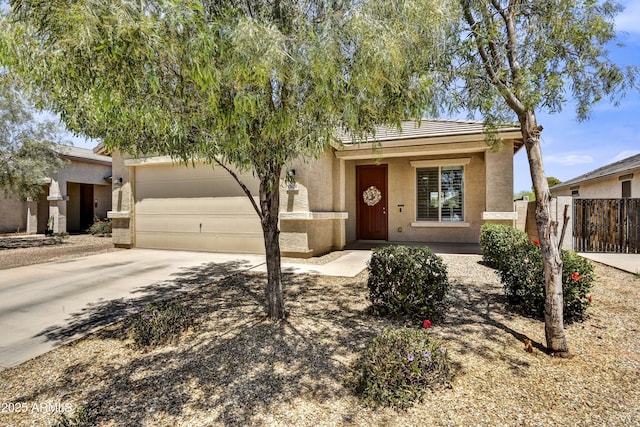 17626 W Paraiso Dr, Surprise, AZ 85387 - view of front of property featuring concrete driveway, stucco siding, an attached garage, and a tile roof