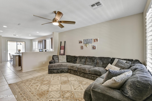 17626 W Paraiso Dr, Surprise, AZ 85387 - living area featuring ceiling fan, light tile patterned floors, recessed lighting, and baseboards