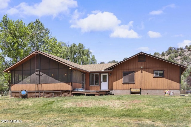 2137 N Flowing Springs Rd, Payson, AZ 85541 - rear view of house with a sunroom, a lawn, a wooden deck, and a shingled roof