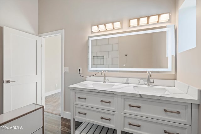 bathroom featuring vanity and wood-type flooring