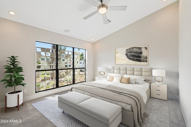 bedroom featuring carpet, ceiling fan, and vaulted ceiling