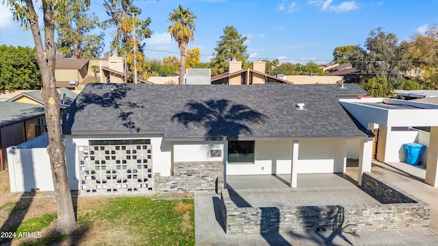 view of front of house featuring a patio