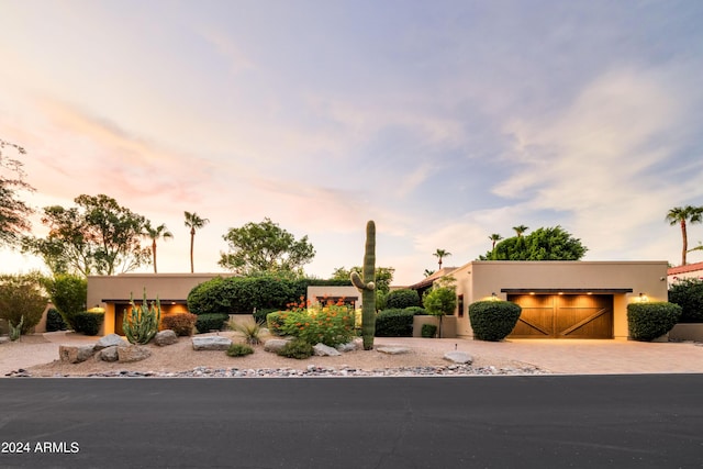 view of front of property featuring a garage