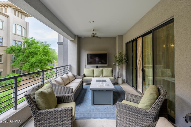 balcony with ceiling fan and an outdoor living space