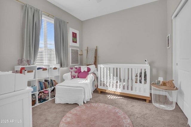 bedroom featuring light carpet