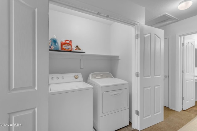 laundry area featuring independent washer and dryer