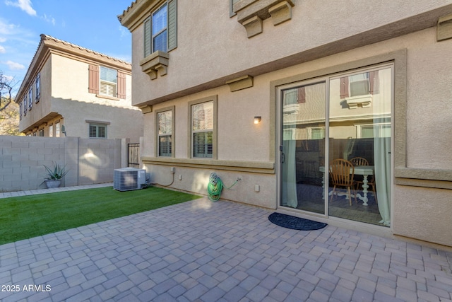 rear view of property featuring a patio