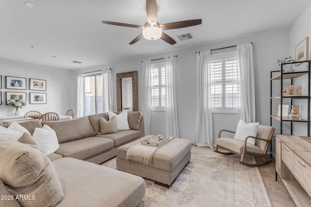 living room featuring ceiling fan