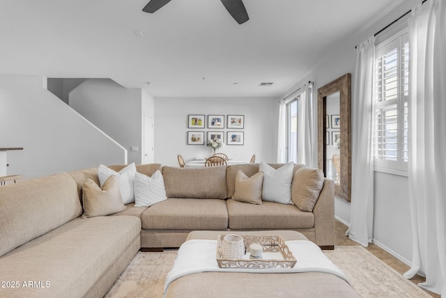 living room featuring ceiling fan