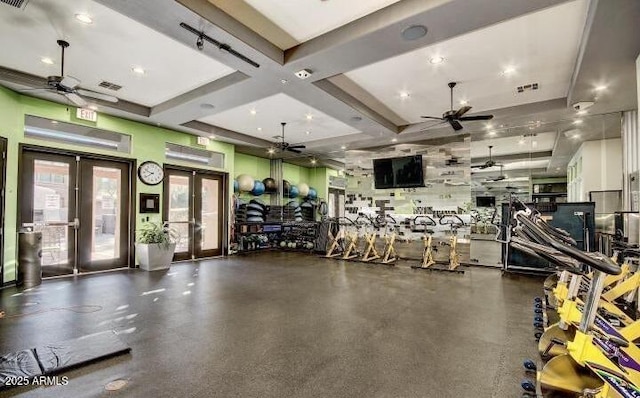 gym with visible vents, coffered ceiling, a ceiling fan, and french doors