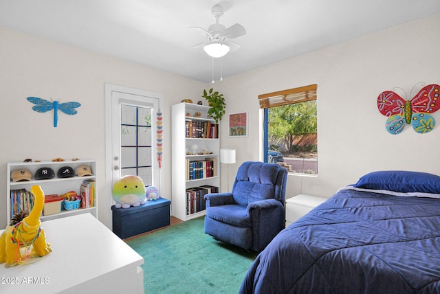 carpeted bedroom featuring ceiling fan