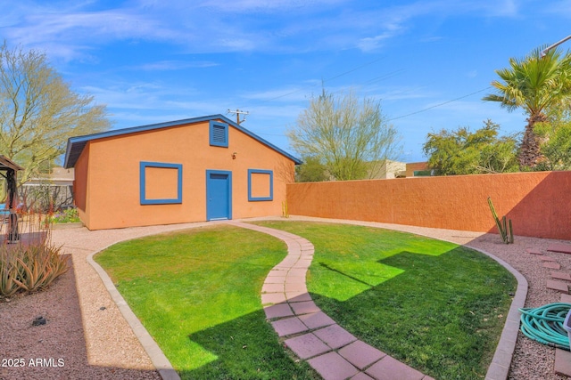 view of yard featuring a fenced backyard