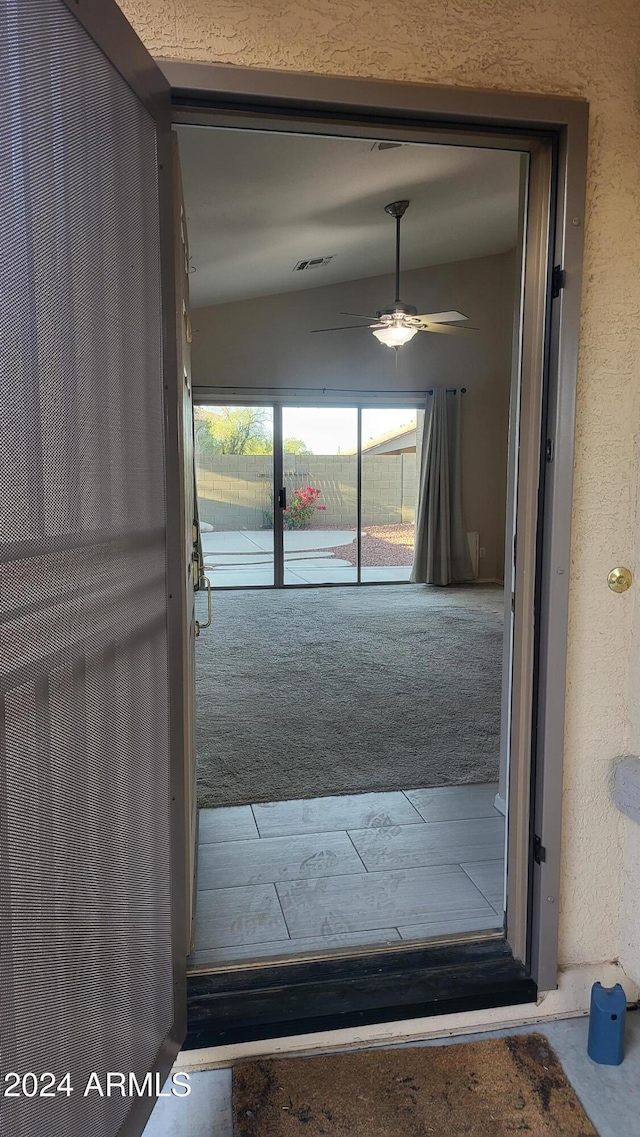 3347 W Steinbeck Dr, Anthem, AZ 85086 - doorway featuring ceiling fan and lofted ceiling