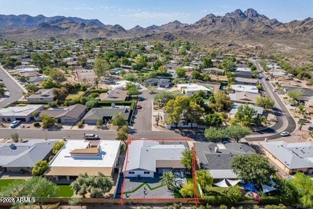 drone / aerial view featuring a mountain view and a residential view