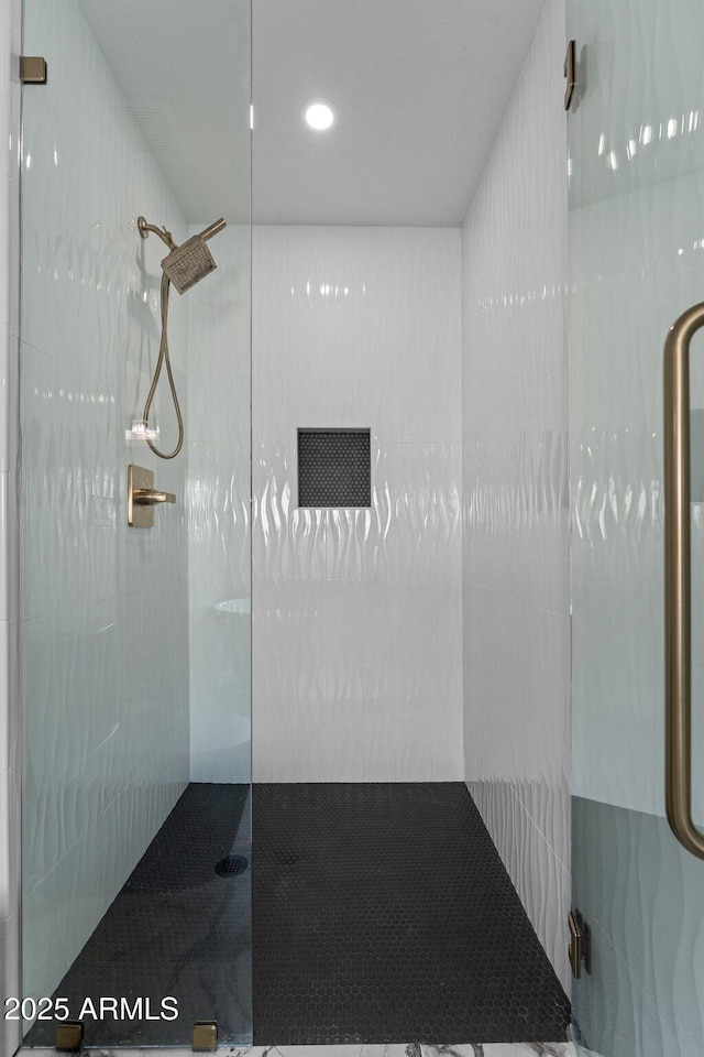 bathroom with walk in shower