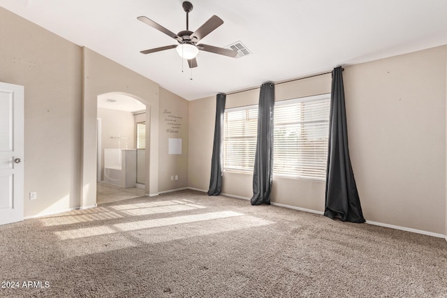 interior space with ceiling fan and lofted ceiling