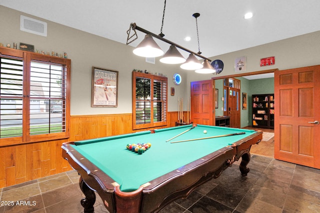 recreation room featuring a wainscoted wall, wooden walls, visible vents, and pool table