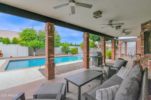 view of patio featuring an outdoor hangout area, a fenced backyard, a fenced in pool, and a grill