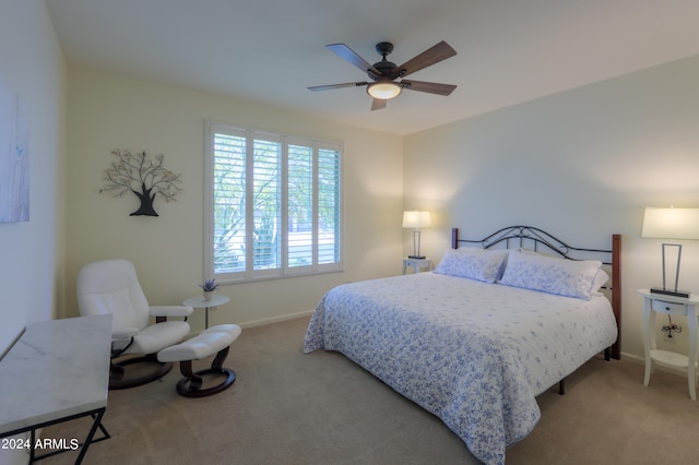 bedroom featuring ceiling fan and carpet flooring