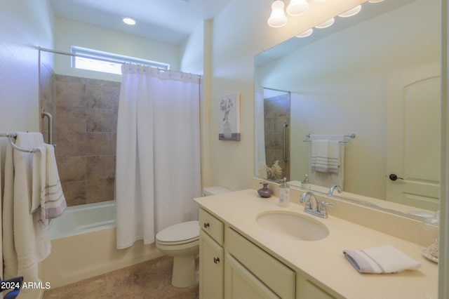 full bathroom featuring tile floors, vanity, shower / tub combo, and toilet