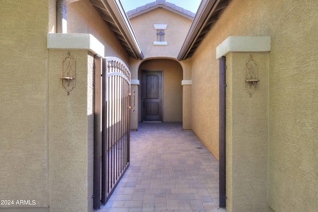 hall with lofted ceiling