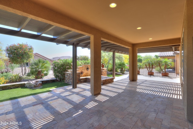 view of terrace featuring a pergola