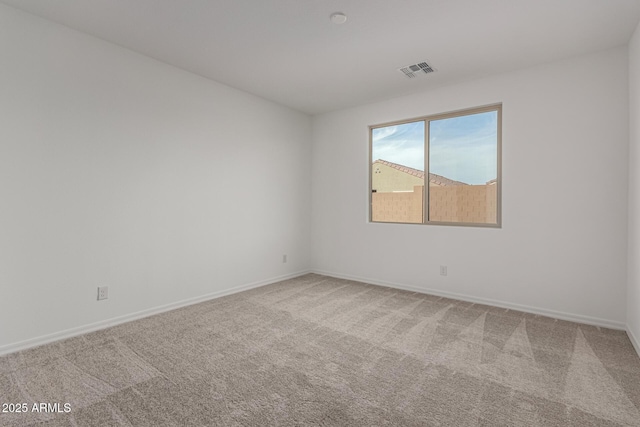 unfurnished room with carpet