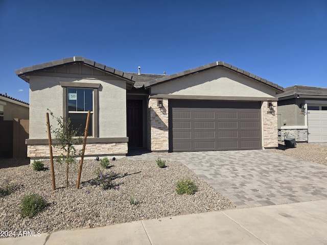 view of front of property featuring a garage