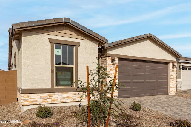 ranch-style home with a garage