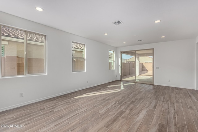 empty room featuring light hardwood / wood-style floors