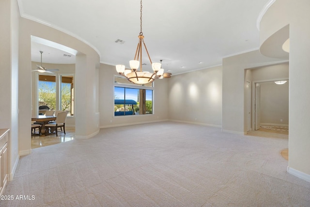 spare room with baseboards, visible vents, light colored carpet, crown molding, and ceiling fan with notable chandelier