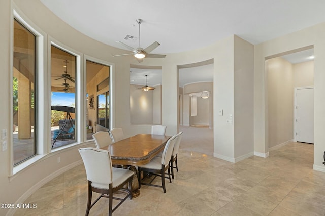 dining room with visible vents and baseboards