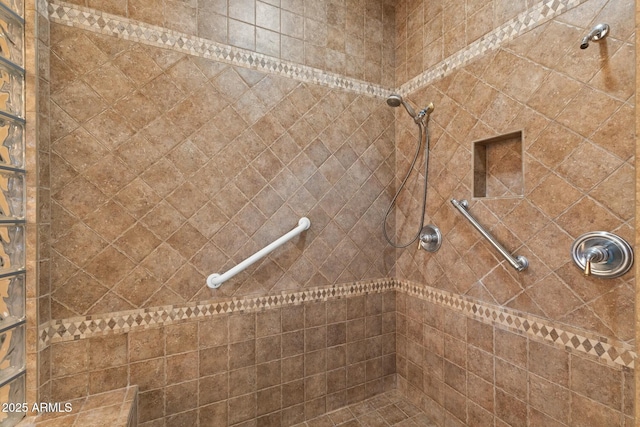 details with a tile shower