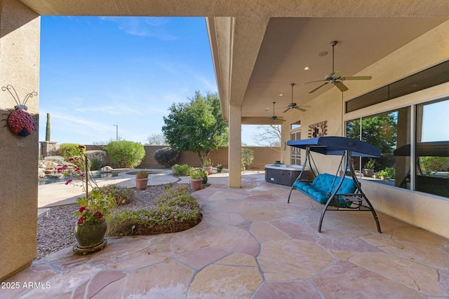 view of patio with ceiling fan and a fenced backyard