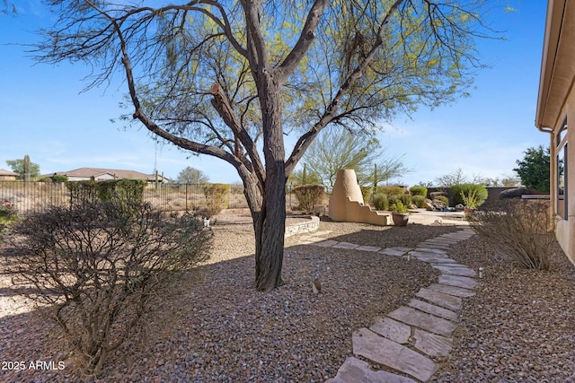 view of yard featuring a patio area and fence